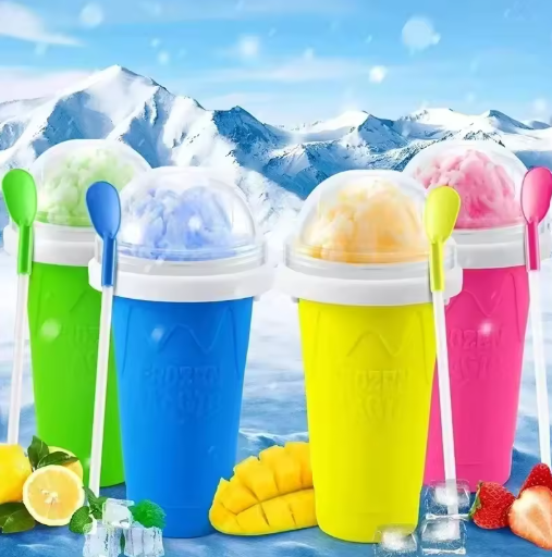 Colorful Slushy Maker Cups with scoops of ice cream against a mountain background